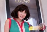 Aktris yang juga sutradara Olga Lydia ketika hadir dalam acara nonton bareng Live Academy Awards 2013 di XXI Epicentrum, Jakarta, Senin (25/2). FOTO ANTARA/Pey Hardi Subiantoro