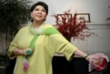 Penyanyi Titiek Puspa saat menghadiri syukuran Hari Musik Nasional di Jakarta, Selasa (12/3). FOTO ANTARA/Teresia May