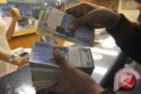 Rupiah Pagi Menguat 84 Poin Jadi Rp11.910