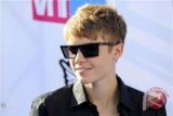 Justin Bieber batalkan sisa tur 