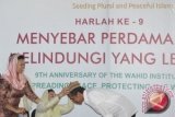 Jokowi Senang Dapatkan Peci Gus Dur