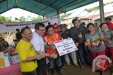 Indosat bantu korban bencana Manado