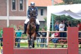 Mojokerto (Antara Jatim) - Atlet Equestrian (Ketangkasan Kuda), Brigjend TNI (Mar) Ivan AR bersama kuda King Petra berusaha melewati halang rintang dalam  nomor Show Jumping Perorangan 30-50 cm dalam kejuaraan terbuka equestrian di Desa Jati Jejer, Trawas, Mojokerto, Jatim, Minggu (16/3). Kejuaraan Equestrian tersebut diikuti oleh tiga klub berkuda Jatim, 50 kuda yang mengikuti 20 nomer lomba. FOTO M Risyal Hidayat/14