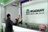 Pegadaian serahkan bantuan program elektrifikasi di Minahasa