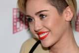  Miley Cyrus Dilarang Konser di Dominika