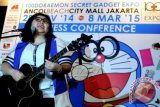Penyanyi keturunan Jepang, finalis X Factor Indonesia Yuka Tan menyanyikan soundtrack Doraemon saat konferensi pers Doraemon 100 Secret Gadget Expo di Jakarta, Selasa (4/11). Expo Doraemon itu akan menampilkan pameran gadget dan 100 boneka diorama Doraemon dengan berbagai kostum yang digelar pada 28 November 2014 - 5 Maret 2015 di Beach City Mall, Ancol, Jakarta. ANTARA FOTO/Teresia May/Asf/Spt/14.