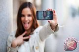 Dalam seminggu, wanita habiskan sekitat 5 jam untuk selfie