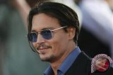 Mengaku jadi korban KDRT Johnny Deep, Amber Heard dipecat