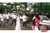 Suasana gerak jalan santai yang digelar KJRI Kuching. (Foto Antara Kalbar / Teguh Imam Wibowo)
