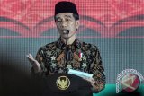 Jokowi Janji Tahun Depan Pakai Peci Gus Dur