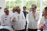 Presiden Joko Widodo meresmikan Pos Lintas Batas Negara (PLBN) terpadu Indonesia - Malaysia di Kecamatan Badau wilayah Kapuas Hulu Kalimantan Barat. (Foto Antara Kalbar / Timotius)