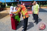 Wakil Bupati Tanah Laut, Kalimantan Selatan H. Sukamta menggelar kegiatan Gemarikan (gemar memasyarakatkan makan ikan), di SDN Tambang Ulang 1, Kamis (16/3). Foto:Antaranews Kalsel/Arianto/G.