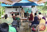 Perum Bulog Kalsel melakukan pembelian gabah petani melalui Program Serap Gabah Petani (Sergap), di Desa Sungai Rasau, Kecamatan Cerbon, Senin (3/4). Foto:Antaranews Kalsel/Arianto/G. 