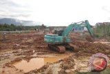 Aktivitas pekerjaan persiapan pembangunan PLB Badau tahap II, Kecamatan Badau, Kapuas Hulu Kalimantan Barat oleh PT Brantas Abipraya Persero. Foto Antara Kalbar/Timotius