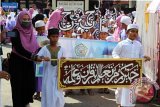 Sebanyak 1.250 santri di Kabupaten Banjar mengikuti Festival Taman Pendidikan Al Quran (TPA) berasal dari 59 TPA se-Kabupaten Banjar ini, akan mengikuti berbagai lomba seperti menulis kaligrafi, Tilawatil Al Qurâ€™an serta sejumlah lomba Islami lainnya di Kota Martapura, Jum\'at (26/4).(Foto Antaranews Kalsel/mc Banjar/f) 