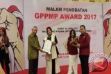 Terima Penghargaan GPPMP