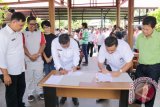Pemkab dan KPU Minahasa Tenggara Sepakati Perubahan NPHD