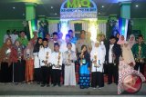 Sebagai tuan rumah Kecamatan Barabai kembali menjadi juara umum Musabaqah Tilawatil Quran Nasional (MTQ) Nasional tingkat Kabupaten Hulu Sungai Tengah (HST) ke-40. Camat Barabai Mursyidi saat penutupan yang dilaksanakan di Masjid Agung Riyadushalihin Barabai Selasa, (23/8). Menyampaikan prestasi itu merupakan juara umum yang ke empat kalinya secara berturut-turut di ajang MTQ tersebut. Foto:Antaranews Kalsel/Upik/G.