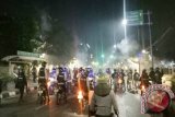 Massa Anti-Komunis Ricuh Polisi Tembakkan Gas Air Mata