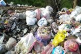 Sampah Pasar Simpangpematang Menumpuk di Jalintim