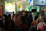 PAMERAN TTG DIBANJIRI WARGA