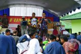 Dalam rangka memperingati Hari Ulang Tahun (HUT) ke-72 Tentara Nasional Indonesia (TNI) Tahun 2017, Komando Distrik Militer (Kodim) 1005 Marabahan menggelar Fun Bike bersama masyarakat, Sabtu (30/9). Foto:Antaranews Kalsel/Arianto/G.