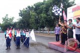 Kepala Badan Perencanaan Pembangunan Daerah Kabupaten Tanah Laut H. Ahmad Nizar membuka secara resmi kegiatan Napak Tilas Jejak Pahlawan,  di halaman Stadion Pertasi Kencana, Kamis (9/11). Foto:Antaranews Kalsel/Arianto/G.