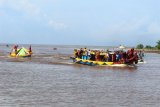 Ritual napak tilas kedatangan Opu Daeng Menambon memasuki Kuala Mempawah. (Foto Istimewa)