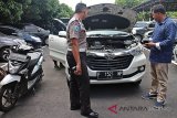 Polisi sita barang-barang milik Hannie Tour