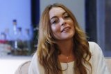 Lindsay Lohan pakai kerudung hadiri Modest fashion week London