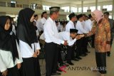 Bupati Batola Hj Noormiliyani AS menghadiri pelantikan Panitia Pemungutan Suara (PPS) se-Kabupaten Batola, di Aula Mufakat Kantor Bupati Batola,Kamis (8/3).Foto:Antaranews Kalsel/Arianto.