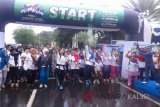 Kanwil Direktorat Jenderal Pajak Kalselteng Menggelar Spectaxcular Color Run 2018,Minggu (18/3).Foto:Antaranews Kalsel/Arianto.