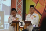 Cabup dan Cawabup Nomor Urut 1 Indra Yasin dan Thariq Modanggu pada Debat Terbuka Antar Calon Bupati dan Wakil Bupati Gorontalo Utara pada Pemilihan Serentak Tahun 2018 (Foto ; Shanty)