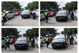 Foto sekuen polisi lalu lintas mengejar siswa yang melanggar lalu lintas saat Operasi Patuh Toba 2018, di Medan, Sumatera Utara, Kamis (26/4). Operasi Patuh Toba yang digelar sejak 26 April hingga 9 Mei 2018 di wilayah di Sumut tersebut untuk mengatasi masalah lalu lintas dan juga untuk mengurangi angka kecelakaan. ANTARA FOTO/Irsan Mulyadi/aww/18.