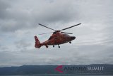 Helikopter Basarnas jenis Dauphin A 365 N3+ 
HR-3604 untuk membantu pencarian korban telah mendarat di Pelabuhan