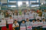 Baznas Gives Scholarships To 2,674 School Students