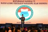  Presiden Joko Widodo memberikan sambutan ketika membuka Munas ke-VI Ikatan Alumni Pergerakan Mahasiswa Islam Indonesia (PMII) di Jakarta, Jumat (20/7/2018). Dalam sambutannya presiden mengapresiasi alumni PMII yang sudah banyak membantu kinerja pemerintah. (ANTARA /Wahyu Putro A)