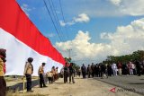 Pemkot Palu bentangkan bendera 1.000 meter di Kampung Nalayan