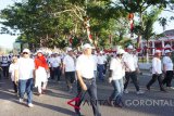 Jalan sehat BUMN Hadir Untuk Negeri (BHUN) yang diikuti oleh ribuan masyarakat Gorontalo, bersama seluruh karyawan BUMN se-Gorontalo, Sabtu (18/8).