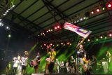 Suasana acara penutupan Rainforest World Music Festival 2018 di 'Jungle Stage' Sarawak Culture Village, Kuching, Malaysia, Juli 2018. Sejak pertama kali digelar pada tahun 1998, RWMF selalu menampilkan pertunjukan musik berkualitas dari sejumlah musisi/kelompok musik yang didatangkan dari sejumlah negara seperti Malaysia, Indonesia, India, USA, Rusia, Korea, Filipina dan sebagainya. Hingga kini RWMF menjadi salah satu event tahunan yang rutin digelar oleh Sarawak Tourism Board dan selalu dipadati wisatawan lokal serta mancanegara. ANTARA FOTO/Jessica Helena Wuysang/18 