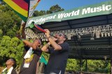 Kelompok musik 1Drums.org and friends menggelar pertunjukan pada Rainforest World Music Festival 2018 di The Big Tent Sarawak Culture Village, Kuching, Malaysia, Juli 2018 . ANTARA FOTO/Jessica Helena Wuysang/18 