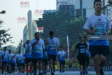 Peserta mengikuti Surabaya Marathon 2018 di Surabaya, Jawa Timur, Minggu (12/8). Surabaya Marathon 2018 diikuti peserta dari dalam dan luar negeri sebanyak 469 pelari di kategori Full Marathon, 1.043 pelari di kategori Half Marathon, 1.593 pelari di kategori 10 kilometer dan 1.295 pelari di kategori 5 kilometer. Antara Jatim/Didik Suhartono/mas/18.
