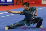 Atlet Wushu Indonesia Edgar Xavier Marvelo saat tampil di nomor Chanquan Putra pada Asian Games 18 di JEXPO, Kemayoran, Jakarta, Minggu (19/8/2018). (ANTARA FOTO/INASGOC/ Gino F Hadi)