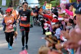 Peserta mengikuti Bromo International Marathon 2018 di kawasan Taman Nasional Bromo Tengger Semeru (TNBTS), Pasuruan, Jawa Timur, Minggu (23/9). Lari marathon sejauh 42 kilometer yang diikuti ratusan peserta dari Eropa, Asia, dan beberapa kota di Indonesia tersebut bertujuan mempromosikan kawasan wisata Taman Nasional Bromo guna meningkatkan jumlah kunjungan wisatawan baik lokal maupun mancanegara. Antara Jatim/Irfan Anshori/mas/18