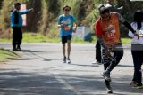 Peserta mengikuti Bromo International Marathon 2018 di kawasan Taman Nasional Bromo Tengger Semeru (TNBTS), Pasuruan, Jawa Timur, Minggu (23/9). Lari marathon sejauh 42 kilometer yang diikuti ratusan peserta dari Eropa, Asia, dan beberapa kota di Indonesia tersebut bertujuan mempromosikan kawasan wisata Taman Nasional Bromo guna meningkatkan jumlah kunjungan wisatawan baik lokal maupun mancanegara. Antara Jatim/Irfan Anshori/mas/18