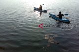 Danau Dendam Tak Sudah yang menghampar di Kota Bengkulu, Provinsi Bengkulu, menyimpan keindahan matahari terbit yang muncul dari balik punggung Bukit Barisan. (Foto Antarabengkulu.com/Sugiharto P)