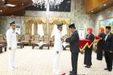 Gubernur Kalimantan Selatan H Sahbirin Noor Melantik Bupati dan Wakil Bupati Tanah Laut Periode 2018-2023, H Sukamta-Abdirahman, di Mahligai Pancasila Banjarmasin, Selasa (19/9).Foto:Antaranews Kalsel/Arianto.