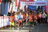 Peserta mengikuti Bromo International Marathon 2018 di kawasan Taman Nasional Bromo Tengger Semeru (TNBTS), Pasuruan, Jawa Timur, Minggu (23/9). Lari marathon sejauh 42 kilometer yang diikuti ratusan peserta dari Eropa, Asia, dan beberapa kota di Indonesia tersebut bertujuan mempromosikan kawasan wisata Taman Nasional Bromo guna meningkatkan jumlah kunjungan wisatawan baik lokal maupun mancanegara. Antara Jatim/Irfan Anshori/mas/18