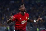 Selebrasi pemain Manchester United Paul Pogba seusai mencetak gol ke gawang BSC Young Boys pada pertandingan Liga Champions Grup H di Stade de Suisse, Bern, Kamis (20/9/2018). Manchester United menang dengan skor 0-3.  (ANTARA FOTO/Reuters/Matthew Childs)