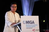 Menteri Keuangan Sri Mulyani Indrawati menyampaikan sambutan saat menghadiri Remark Multilateral Investment Guarantee Agency (MIGA) - LPEI Cocktail pada rangkaian Pertemuan Tahunan IMF - World Bank Group 2018 di The Laguna Resort, Nusa Dua, Bali, Selasa (9/10/2018). ANTARA FOTO/ICom/AM IMF-WBG/Jefri Tarigan/foc..